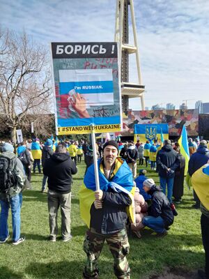 Russian-pro-ukraine-seattle-white-blue-white-flag-blood-wiped-seattle-rally.jpeg